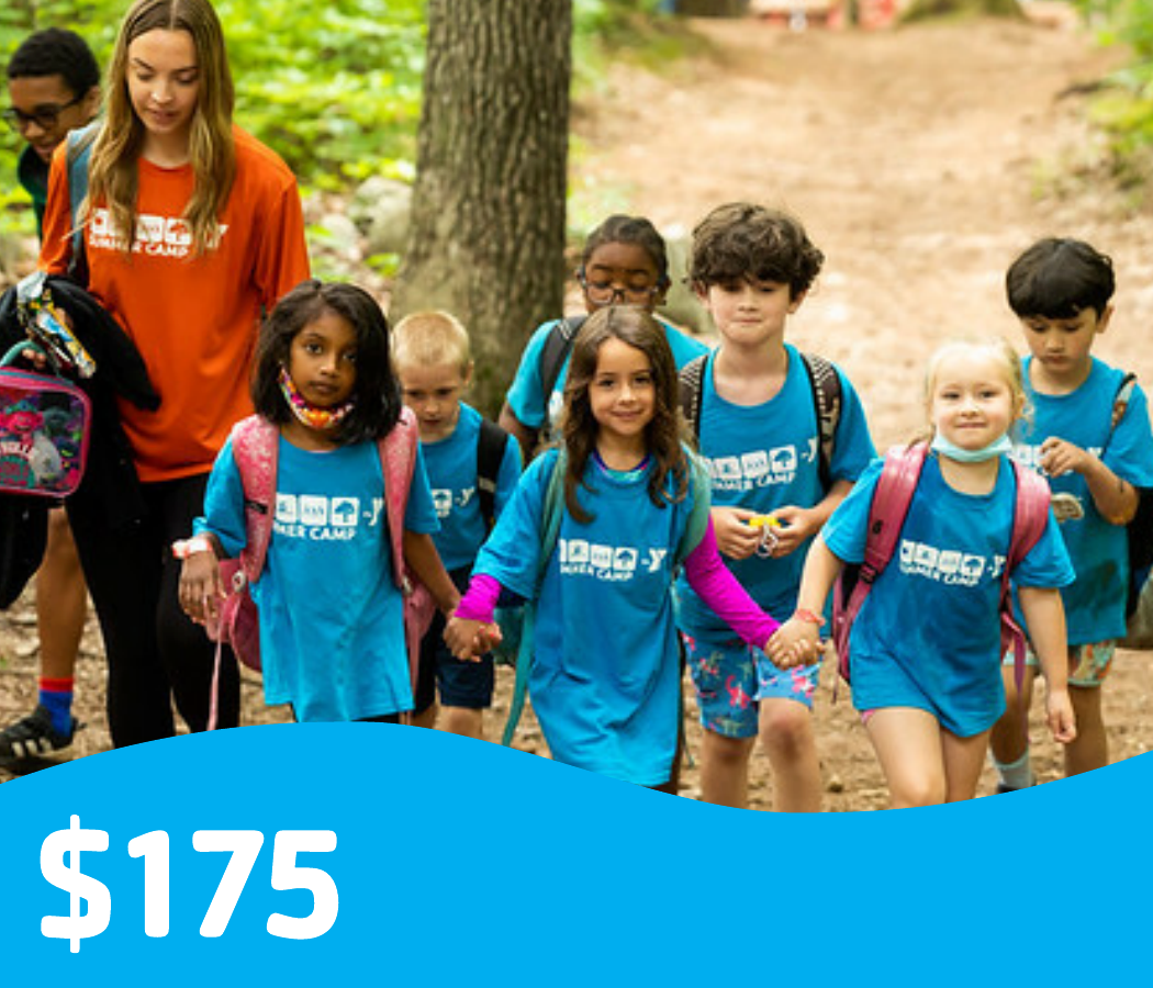 $175 giving level camp youth and counselor holding hands walking in woods