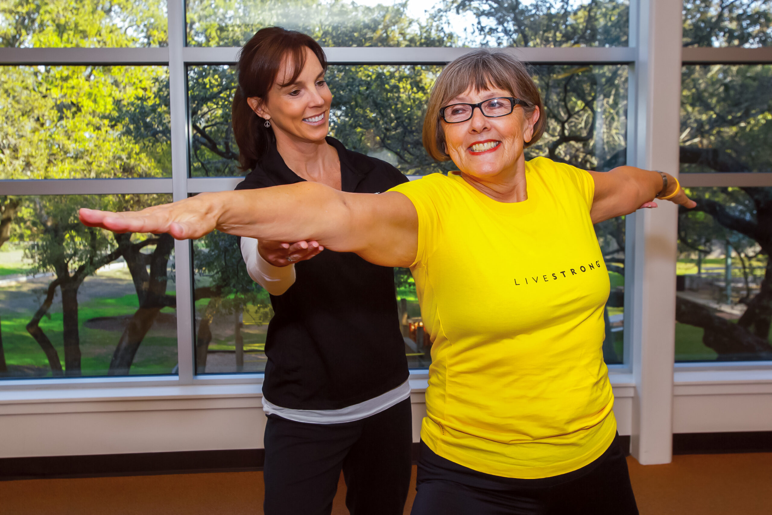 LIVESTRONG AT THE YMCA instructor and female participant available at the Darien YMCA